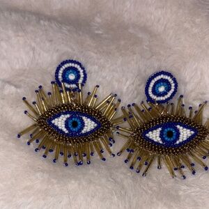 America and Beyond Blue and Gold tone Beaded Eye Earrings